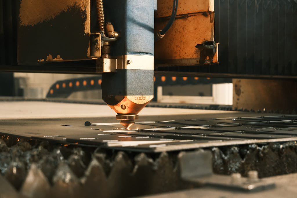 Close-up of a laser cutter operating in an industrial setting in Ankara, Türkiye.